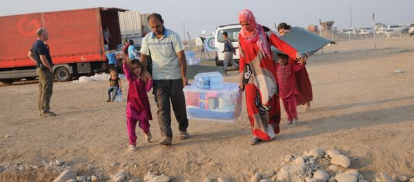 In this photo residents of Mosul and the nearby villages are seen being accomodated in the Hazir refugee camp In this photo residents of Mosul and the nearby villages are seen being accomodated in the Hazir refugee camp - Sputnik International