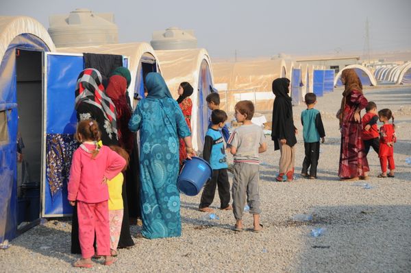 In this photo residents of Mosul and the nearby villages are seen being accomodated in the Hazir refugee camp In this photo residents of Mosul and the nearby villages are seen being accomodated in the Hazir refugee camp - Sputnik International