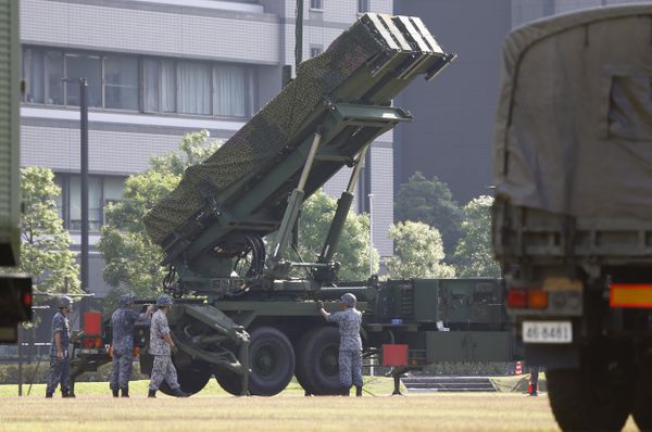 Japan Self-Defense Force members set up a PAC-3 Patriot missile unit deployed ahead of North Korea's planned rocket launch at the Defense Ministry in Tokyo, Tuesday, June 21, 2016 - Sputnik International