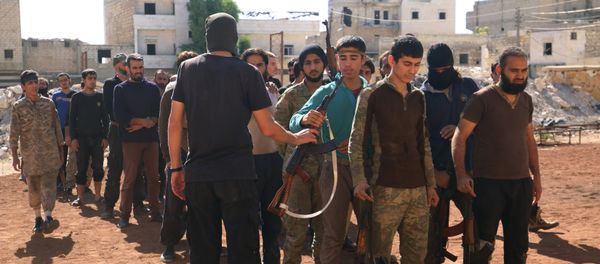 Rebel fighters part of the Jabhat Fatah al Sham, attend military training in the besieged rebel held Aleppo, Syria October 26, 2016 - Sputnik International