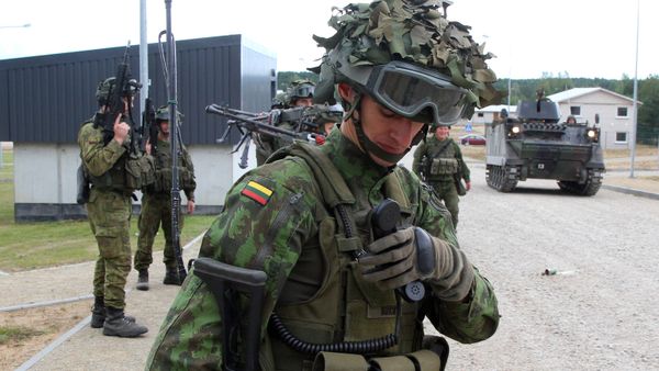Lithuanian army soldiers take part in an exercise following the official opening of a military training centre for urban warfare in Pabrade, Lithuania, on August 30, 2016 Lithuanian army soldiers take part in an exercise following the official opening of a military training centre for urban warfare in Pabrade, Lithuania, on August 30, 2016 - Sputnik International