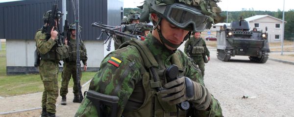 Lithuanian army soldiers take part in an exercise following the official opening of a military training centre for urban warfare in Pabrade, Lithuania, on August 30, 2016 - Sputnik International