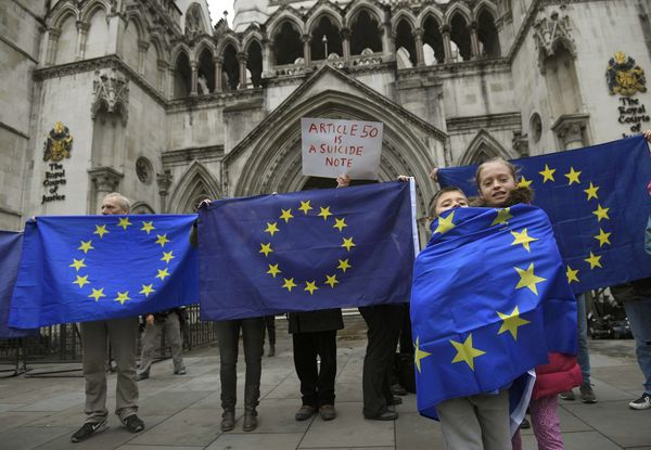 Demonstrators stand outside the High Court during a legal challenge to force the British government to seek parliamentary approval before starting the formal process of leaving the European Union, in London, Britain, October 13, 2016 Demonstrators stand outside the High Court during a legal challenge to force the British government to seek parliamentary approval before starting the formal process of leaving the European Union, in London, Britain, October 13, 2016 - Sputnik International