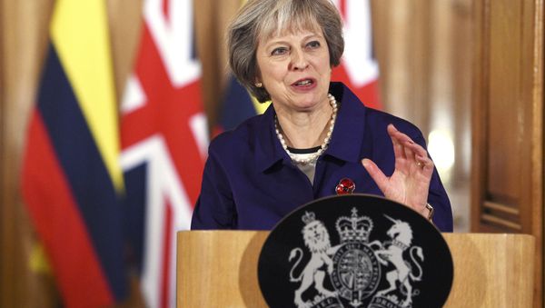Britain's Prime Minister Theresa May and Colombia's President Juan Manuel Santos (not shown) speak to journalists after their bilateral meeting at 10 Downing Street in London, November 2, 2016. Britain's Prime Minister Theresa May and Colombia's President Juan Manuel Santos (not shown) speak to journalists after their bilateral meeting at 10 Downing Street in London, November 2, 2016. - Sputnik International