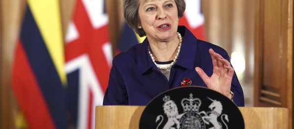 Britain's Prime Minister Theresa May and Colombia's President Juan Manuel Santos (not shown) speak to journalists after their bilateral meeting at 10 Downing Street in London, November 2, 2016. - Sputnik International