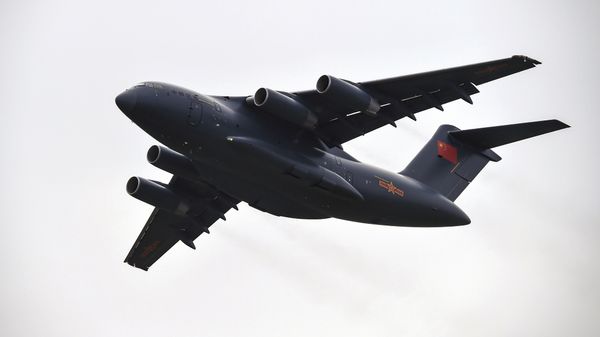 A Xian Y-20 heavy transport aircraft flies past during the Zhuhai Air Show in Zhuhai, southern China's Guangdong province on November 1, 2016. - Sputnik International