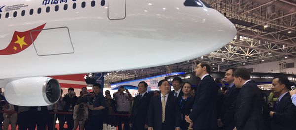 Minister of Trade and Industry of the Russian Federation Denis Manturov talks with Jin Zhuanglong, chairman of Commercial Aircraft Corporation of China (COMAC), during an unveil ceremony at an air show, the China International Aviation and Aerospace Exhibition, in Zhuhai, Guangdong Province, China, November 2, 2016. Minister of Trade and Industry of the Russian Federation Denis Manturov talks with Jin Zhuanglong, chairman of Commercial Aircraft Corporation of China (COMAC), during an unveil ceremony at an air show, the China International Aviation and Aerospace Exhibition, in Zhuhai, Guangdong Province, China, November 2, 2016. - Sputnik International