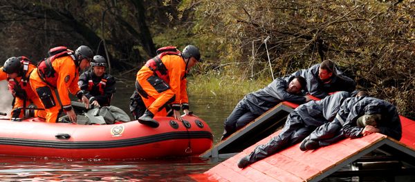 Rescue workers evacuate mock flood victims as part of an international field exercise organised and conducted by NATO's Euro-Atlantic Disaster Response Coordination Centre (EADRCC) in Podgorica, Montenegro Rescue workers evacuate mock flood victims as part of an international field exercise organised and conducted by NATO's Euro-Atlantic Disaster Response Coordination Centre (EADRCC) in Podgorica, Montenegro - Sputnik International
