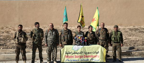 Syrian Democratic Forces (SDF) commanders attend a news conference in Ain Issa, Raqqa Governorate, Syria November 6, 2016. Syrian Democratic Forces (SDF) commanders attend a news conference in Ain Issa, Raqqa Governorate, Syria November 6, 2016. - Sputnik International