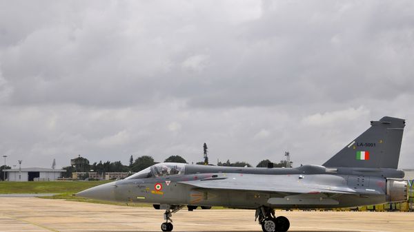 An Indian Air Force (IAF) pilot taxies a newly commissioned Tejas or Light Combat Aircraft (LCA) on a runway in Bangalore during a ceremony in the southern Indian city. (File) - Sputnik International