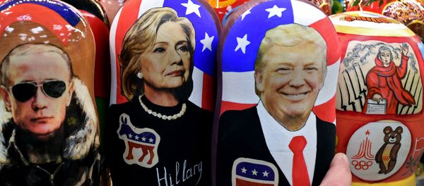 Traditional Russian wooden nesting dolls, Matryoshka dolls, depicting Russia's President Vladimir Putin, US Democratic presidential nominee Hillary Clinton and US Republican presidential nominee Donald Trump are seen on sale at a gift shop in central Moscow on November 8, 2016 Traditional Russian wooden nesting dolls, Matryoshka dolls, depicting Russia's President Vladimir Putin, US Democratic presidential nominee Hillary Clinton and US Republican presidential nominee Donald Trump are seen on sale at a gift shop in central Moscow on November 8, 2016 - Sputnik International