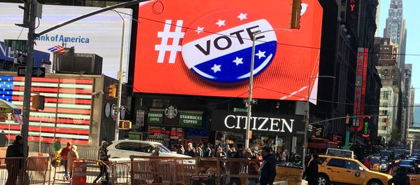 An electronic billboard displays a vote hashtag at Times Square in New York, U.S., November 7, 2016 An electronic billboard displays a vote hashtag at Times Square in New York, U.S., November 7, 2016 - Sputnik International