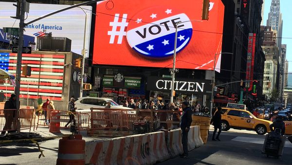An electronic billboard displays a vote hashtag at Times Square in New York, U.S., November 7, 2016 - Sputnik International