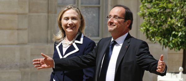 US Secretary of State Hillary Rodham Clinton is greeted by French President Francois Hollande prior to their meeting at the Elysee Palace in Paris (File) - Sputnik International