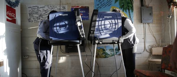 People vote at the Bermuda voting precinct at Causey's Country Store in the U.S. presidential election in Dillon, South Carolina, U.S. November 8, 2016 People vote at the Bermuda voting precinct at Causey's Country Store in the U.S. presidential election in Dillon, South Carolina, U.S. November 8, 2016 - Sputnik International