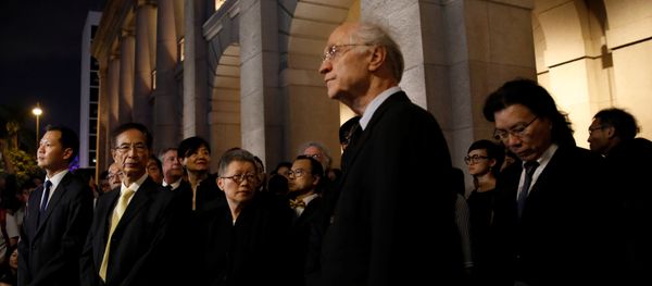 Legislator and barrister Dennis Kwok (L) and Former legislator Martin Lee (2nd-L) wearing black stage a silent protest to the Court of Final Appeal against China's parliament passed an interpretation of Basic Law, in Hong Kong, China November 8, 2016 - Sputnik International