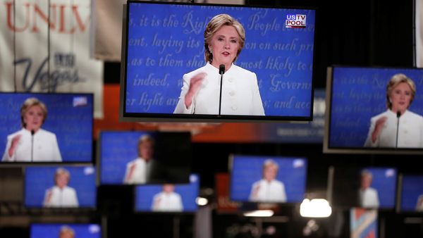 Democratic US presidential nominee Hillary Clinton is shown on TV monitors in the media filing room on the campus of University of Nevada, Las Vegas, during the last 2016 US presidential debate in Las Vegas, US., October 19, 2016. - Sputnik International