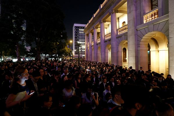 Hundreds of members from the legal sector stage a silent protest outside the Court of Final Appeal, against Beijing's most direct intervention in Hong Kong's legal and political system since the 1997 handover, in Hong Kong, China November 8, 2016 Hundreds of members from the legal sector stage a silent protest outside the Court of Final Appeal, against Beijing's most direct intervention in Hong Kong's legal and political system since the 1997 handover, in Hong Kong, China November 8, 2016 - Sputnik International