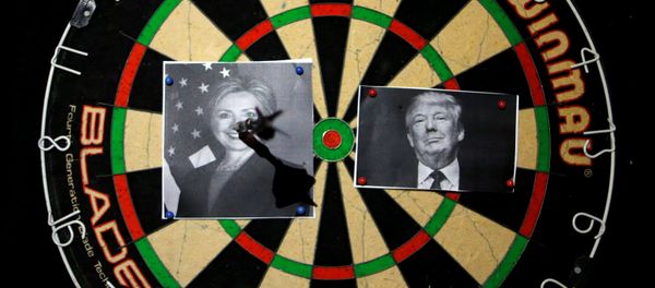 A dart board with images of Republican U.S. presidential candidate Donald Trump (R) and Democratic U.S. presidential candidate Hillary Clinton is seen at an election event held by Republicans Overseas Israel at a bar in Jerusalem November 9, 2016 A dart board with images of Republican U.S. presidential candidate Donald Trump (R) and Democratic U.S. presidential candidate Hillary Clinton is seen at an election event held by Republicans Overseas Israel at a bar in Jerusalem November 9, 2016 - Sputnik International