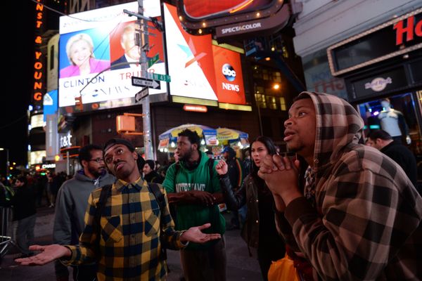 Supporters of Democratic candidate Hillary Clinton on Times Square in New York follow the preliminary vote results - Sputnik International