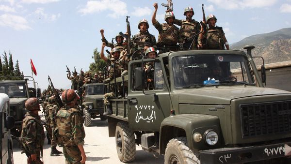 Syrian army soldiers standing on their military trucks chanting slogans in support of Syrian President Bashar Assad, as they enter a village near the town of Jisr al-Shughour, north of Damascus, Syria (File) Syrian army soldiers standing on their military trucks chanting slogans in support of Syrian President Bashar Assad, as they enter a village near the town of Jisr al-Shughour, north of Damascus, Syria (File) - Sputnik International