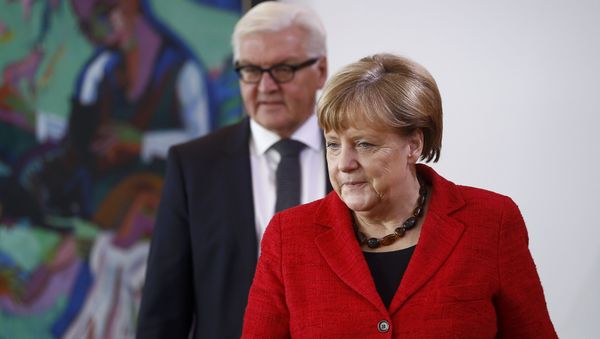 German Chancellor Angela Merkel and Foreign Minister Frank-Walter Steinmeier arrive for the weekly cabinet meeting at the Chancellery in Berlin, Germany, November 9, 2016 German Chancellor Angela Merkel and Foreign Minister Frank-Walter Steinmeier arrive for the weekly cabinet meeting at the Chancellery in Berlin, Germany, November 9, 2016 - Sputnik International