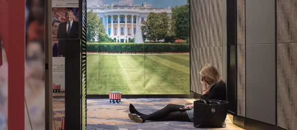 A woman sits on the floor behind a cut-outs of US presidential nominees Hillary Clinton and Donald Trump at an election event organised by the US embassy, at a hotel in Seoul on November 9, 2016 A woman sits on the floor behind a cut-outs of US presidential nominees Hillary Clinton and Donald Trump at an election event organised by the US embassy, at a hotel in Seoul on November 9, 2016 - Sputnik International