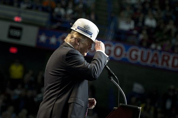 US Republican presidential candidate Donald Trump puts on a miner's hat while speaking during a rally on May 5, 2016 in Charleston, West Virginia US Republican presidential candidate Donald Trump puts on a miner's hat while speaking during a rally on May 5, 2016 in Charleston, West Virginia - Sputnik International