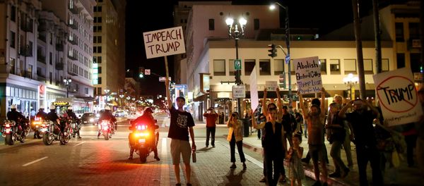 Demonstrators walk through Downtown San Diego in protest to the election of Republican Donald Trump as the president of the United States in San Diego, California, U.S. November 9, 2016 Demonstrators walk through Downtown San Diego in protest to the election of Republican Donald Trump as the president of the United States in San Diego, California, U.S. November 9, 2016 - Sputnik International