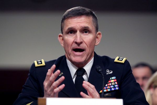 In this Feb. 11, 2014 file photo, then-Defense Intelligence Agency Director Lt. Gen. Michael Flynn testifies on Capitol Hill in Washington In this Feb. 11, 2014 file photo, then-Defense Intelligence Agency Director Lt. Gen. Michael Flynn testifies on Capitol Hill in Washington - Sputnik International
