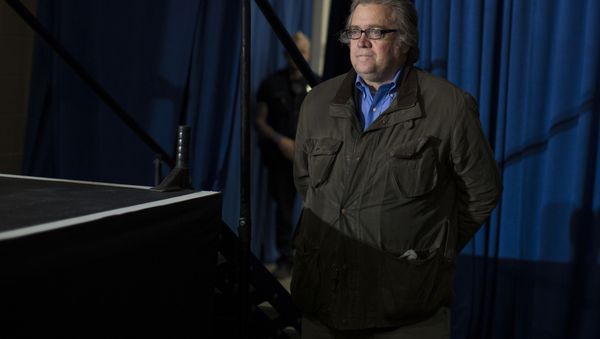 Stephen Bannon, campaign CEO for Republican presidential candidate, Donald Trump, looks on as Trump speaks during a campaign rally, Saturday, Nov. 5, 2016, in Denver - Sputnik International