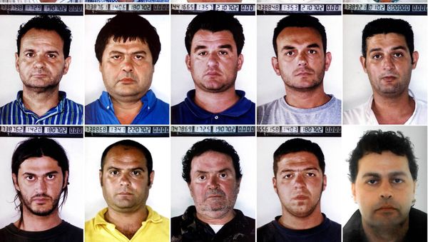 Suspected members of the November 17 terrorist group in custody are seen in this combo of photos - Sputnik International