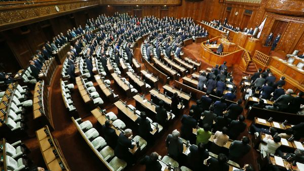 Ruling coalition lawmakers stand to approve the passage of the Trans-Pacific Partnership (TPP) free trade deal in the lower house of the parliament in Tokyo on November 10, 2016 - Sputnik International