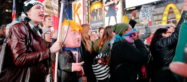 People protest against Republican president-elect Donald Trump in the neighborhood of Manhattan in New York, U.S., November 9, 2016 People protest against Republican president-elect Donald Trump in the neighborhood of Manhattan in New York, U.S., November 9, 2016 - Sputnik International