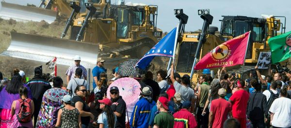 Members of the Standing Rock Sioux Tribe and their supporters opposed to the Dakota Access Pipeline (DAPL) confront bulldozers working on the new oil pipeline in an effort to make them stop, September 3, 2016, near Cannon Ball, North Dakota Members of the Standing Rock Sioux Tribe and their supporters opposed to the Dakota Access Pipeline (DAPL) confront bulldozers working on the new oil pipeline in an effort to make them stop, September 3, 2016, near Cannon Ball, North Dakota - Sputnik International