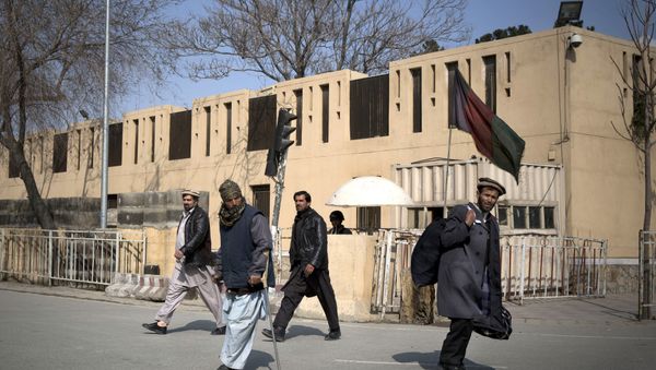 Afghans walk by the Serena hotel in downtown Kabul, Afghanistan, Friday, March 21, 2014 Afghans walk by the Serena hotel in downtown Kabul, Afghanistan, Friday, March 21, 2014 - Sputnik International