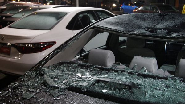 Damaged cars sit on a lot after a riot swept through the area in protest to the election of Republican Donald Trump as President of the United States in Portland, Oregon, U.S. November 10, 2016 - Sputnik International