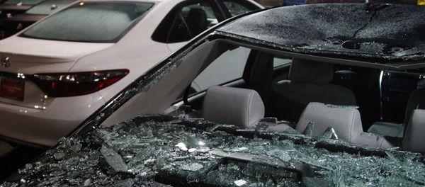 Damaged cars sit on a lot after a riot swept through the area in protest to the election of Republican Donald Trump as President of the United States in Portland, Oregon, U.S. November 10, 2016 - Sputnik International
