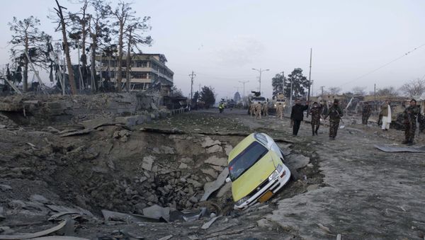 Afghan security forces and NATO troops arrive at the site of explosion near the German consulate office in Mazar-i-Sharif, Afghanistan November 11, 2016 - Sputnik International