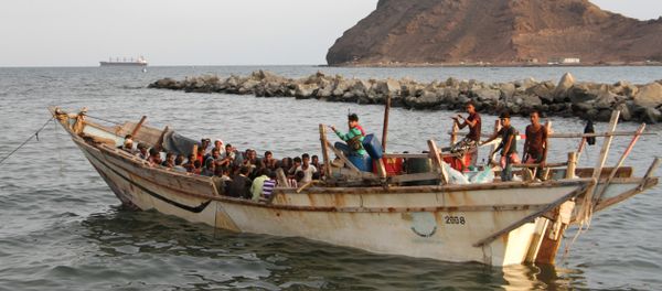 African illegal immigrants sit on a boat in the southern port city of Aden on September 26, 2016, before being deported to Somalia African illegal immigrants sit on a boat in the southern port city of Aden on September 26, 2016, before being deported to Somalia - Sputnik International
