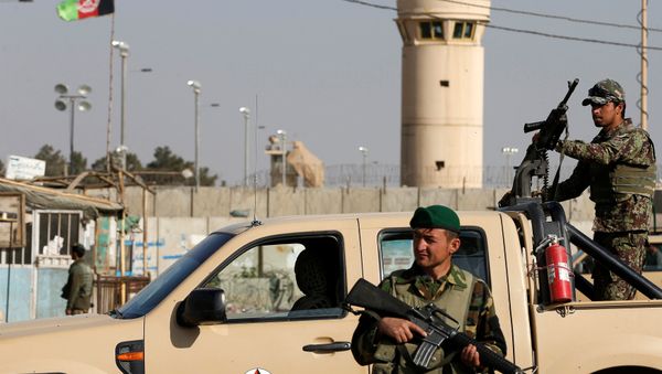 Afghan National Army (ANA) soldiers keep watch outside the Bagram Airfield entrance gate, after an explosion at the NATO air base, north of Kabul, Afghanistan November 12, 2016. - Sputnik International