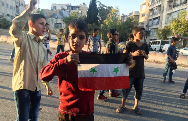 Children in the humanitarian corridor Bustan al-Qasr on the Eastern-Western Aleppo border, Syria. - Sputnik International