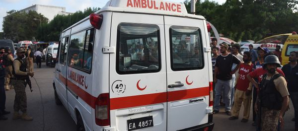 Pakistani paramilitary soldiers escort an ambulance Pakistani paramilitary soldiers escort an ambulance - Sputnik International