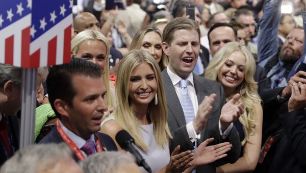 Republican Presidential Candidate Donald Trump's children Donald Trump, Jr., Ivanka Trump, Eric Trump and Tiffany Trump celebrate on the convention floor during the second day session of the Republican National Convention in Cleveland, Tuesday, July 19, 2016. - Sputnik International