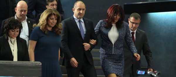 Presidential candidate of the Bulgarian Socialist Party Rumen Radev arrives for a news conference with his wife Desislava in Sofia, Bulgaria, November 13, 2016. Presidential candidate of the Bulgarian Socialist Party Rumen Radev arrives for a news conference with his wife Desislava in Sofia, Bulgaria, November 13, 2016. - Sputnik International