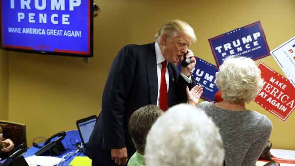 Republican presidential candidate Donald Trump talks on the phone as he visits a call center before a rally in Asheville, N.C. (File) Republican presidential candidate Donald Trump talks on the phone as he visits a call center before a rally in Asheville, N.C. (File) - Sputnik International