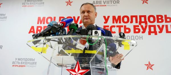Moldova's Socialist Party presidential candidate Igor Dodon speaks to the media after a presidential election at his election headquarters in Chisinau, Moldova, November 14, 2016. Moldova's Socialist Party presidential candidate Igor Dodon speaks to the media after a presidential election at his election headquarters in Chisinau, Moldova, November 14, 2016. - Sputnik International