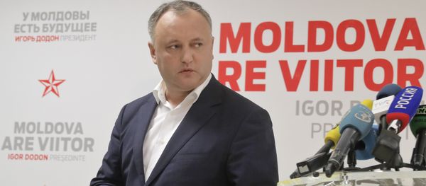 Socialist Party presidential candidate Igor Dodon leaves after a press briefing in Chisinau, Moldova, Sunday, Nov. 13, 2016. Socialist Party presidential candidate Igor Dodon leaves after a press briefing in Chisinau, Moldova, Sunday, Nov. 13, 2016. - Sputnik International