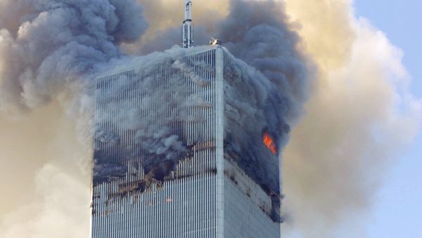 Fire and smoke billows from the north tower of New York's World Trade Center after terrorists crashed two hijacked airliners into the World Trade Center and brought down the twin 110-story towers. (File) - Sputnik International