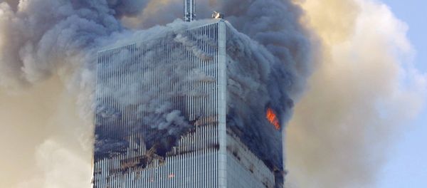 Fire and smoke billows from the north tower of New York's World Trade Center after terrorists crashed two hijacked airliners into the World Trade Center and brought down the twin 110-story towers. (File) Fire and smoke billows from the north tower of New York's World Trade Center after terrorists crashed two hijacked airliners into the World Trade Center and brought down the twin 110-story towers. (File) - Sputnik International
